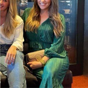 Green top and trousers